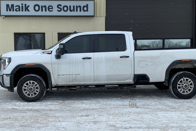 2025 GMC 2500HD with professional window tint in North Bay